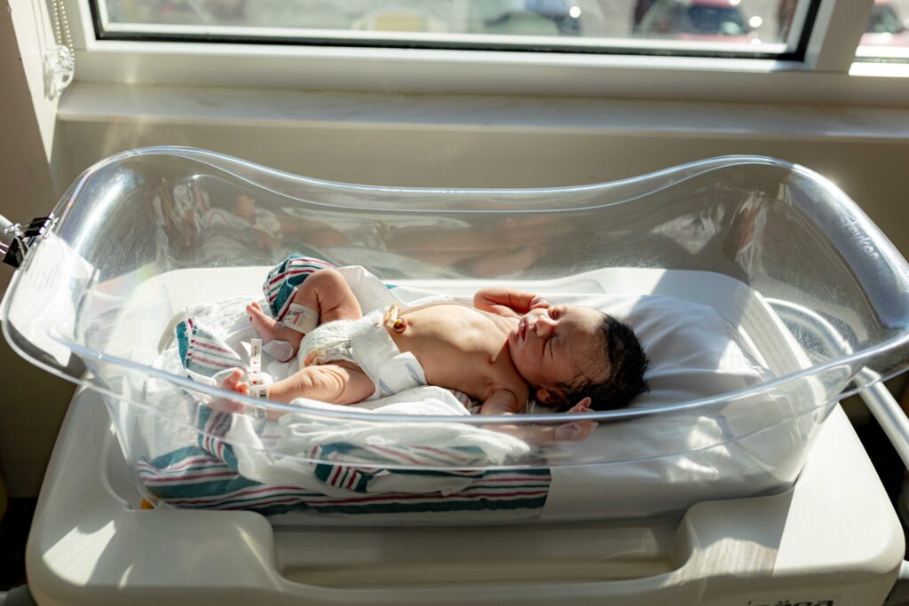 Fresh 48 newborn photography in Charleston, SC – natural hospital session capturing baby’s first precious hours.